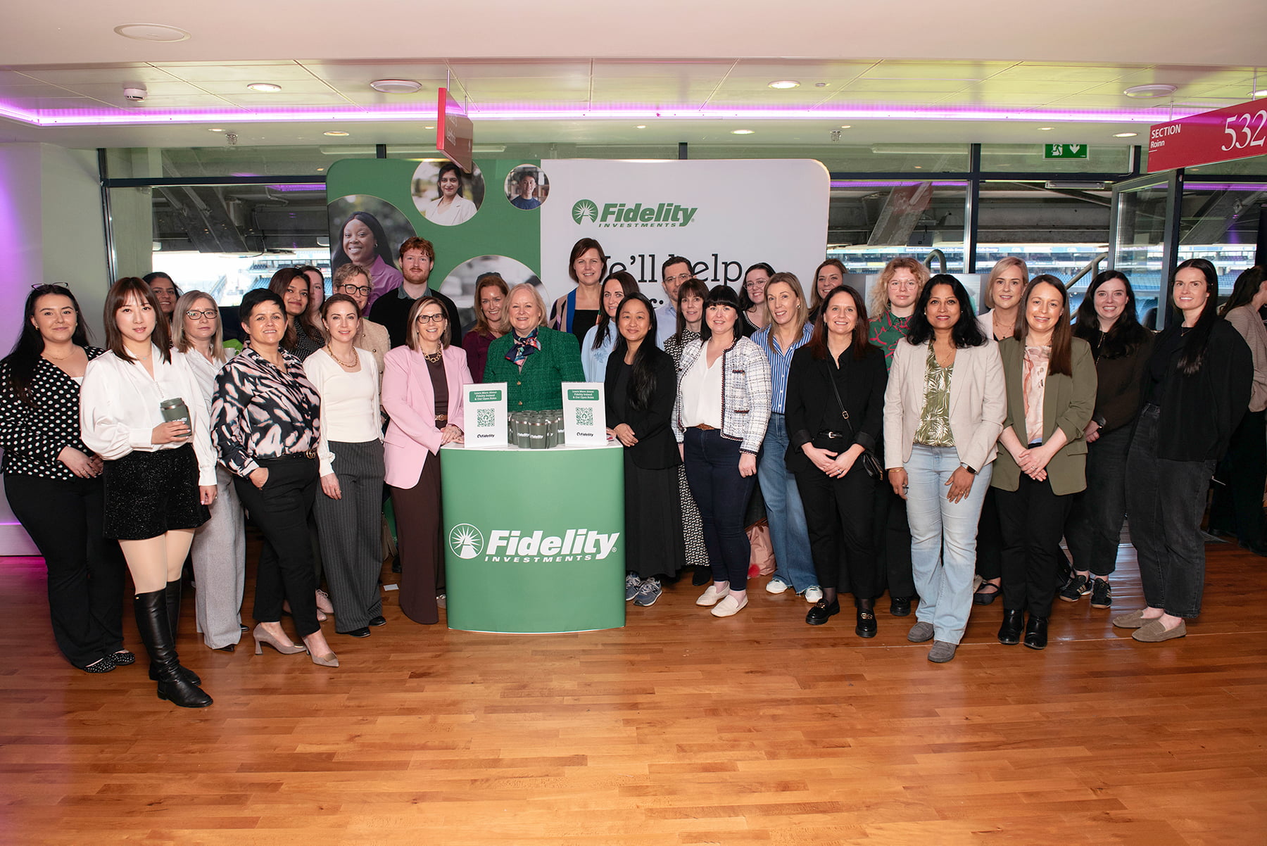 a group of people posing for a photo
