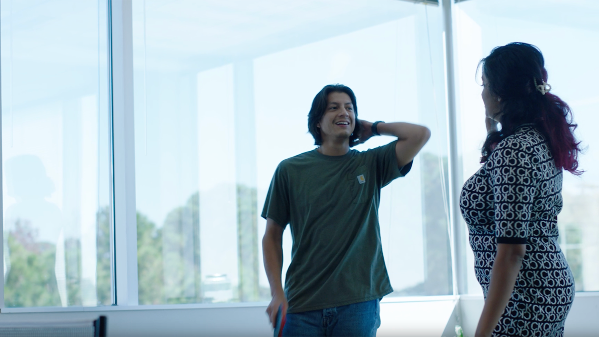 a person standing in front of a window