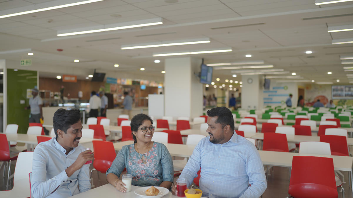 a group of people sitting at a table