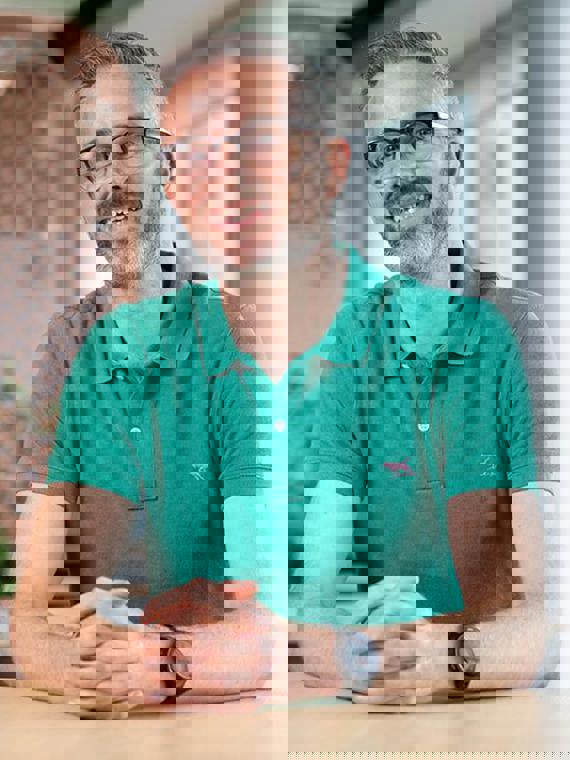 a person in a green shirt