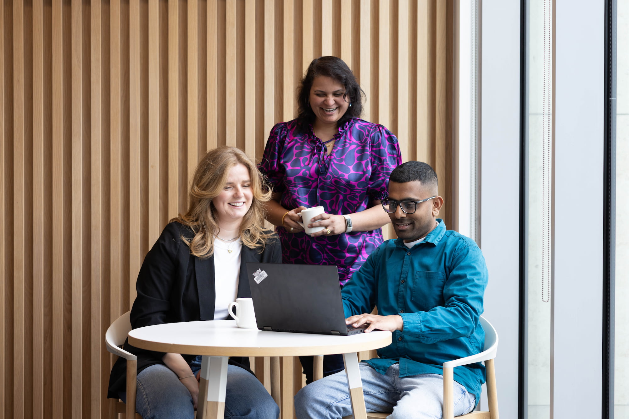 a group of people sitting at a table