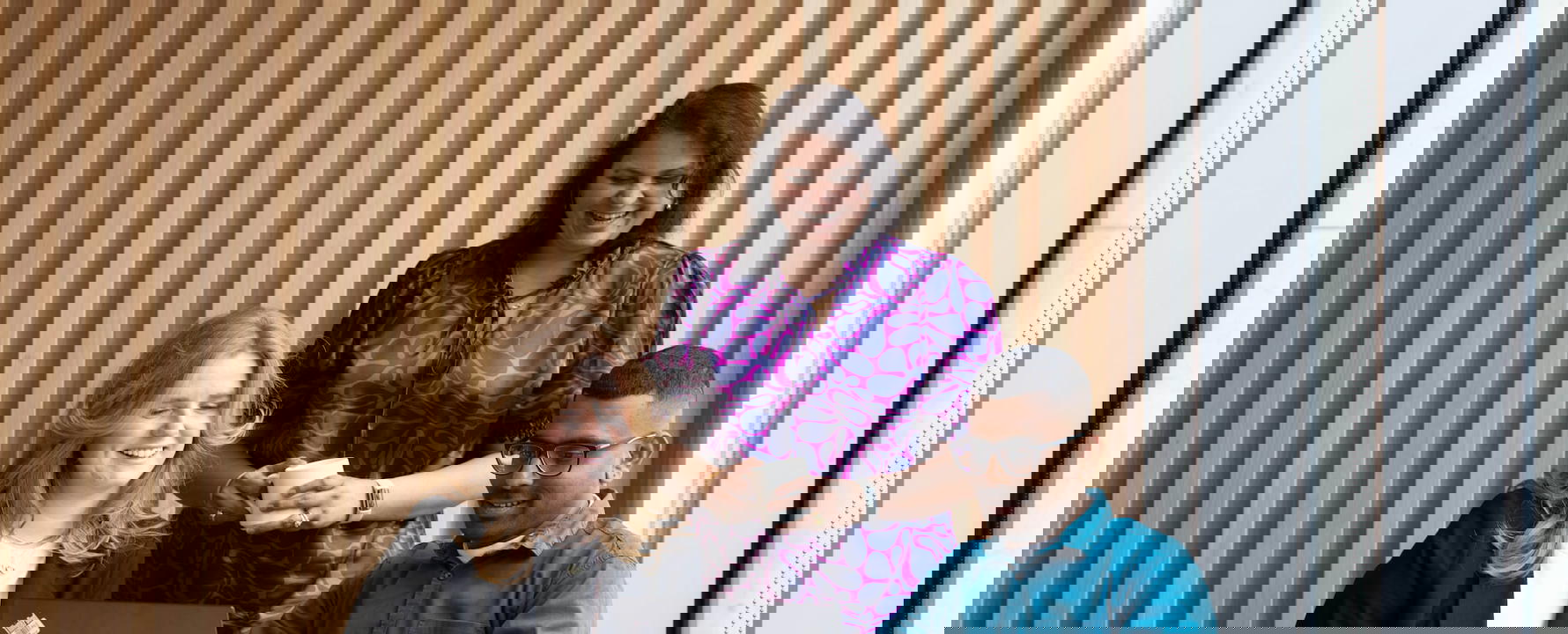 a group of people sitting at a table