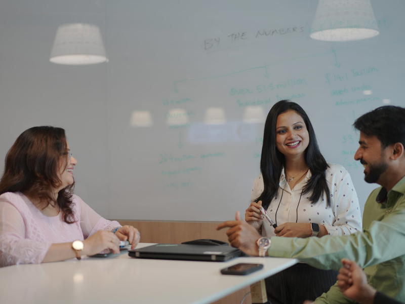 a group of people sitting at a table