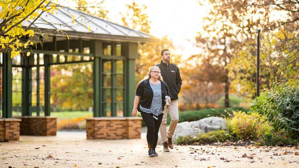 a person and person walking down a path