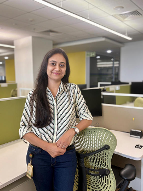 a person standing in an office