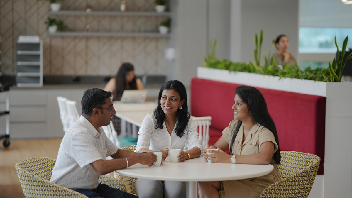 a group of people sitting at a table