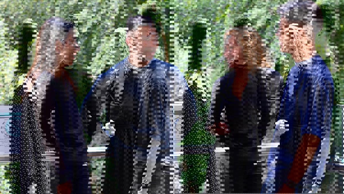 a group of people standing outside