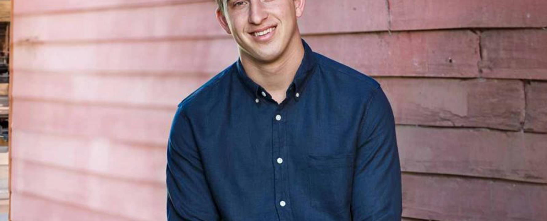 a person smiling at the camera