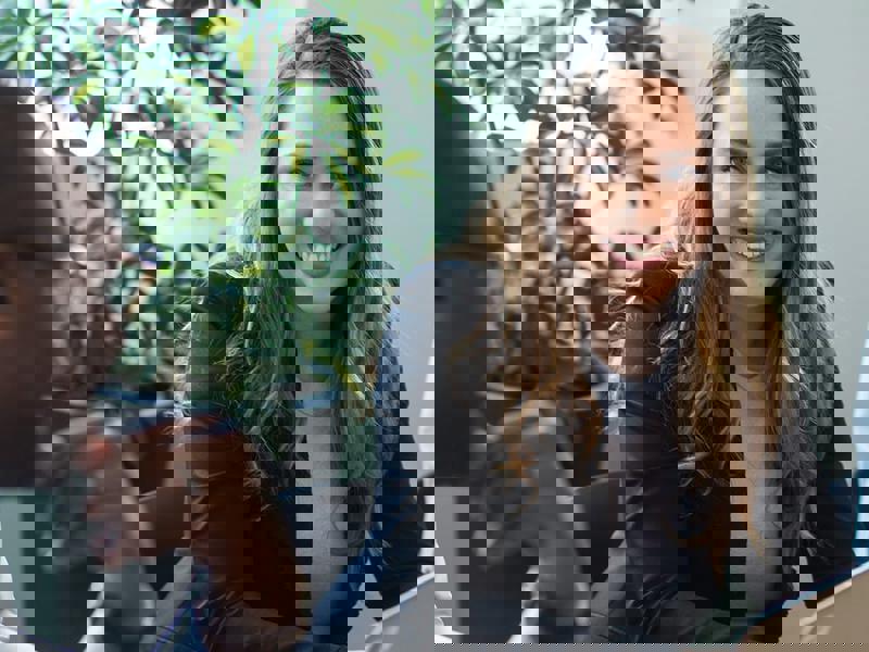 a person smiling at a person