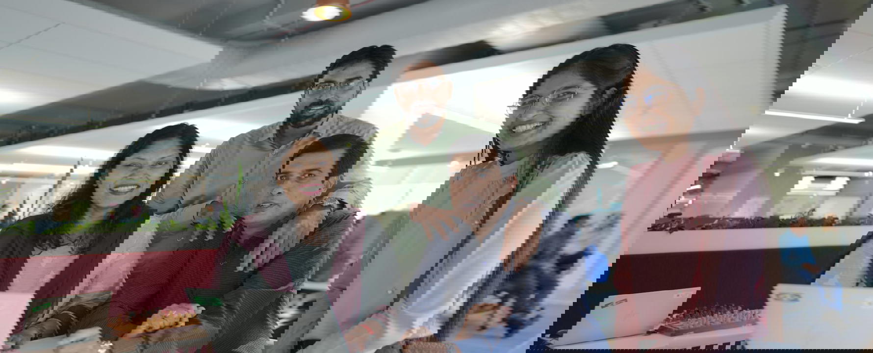 a group of people posing for a photo