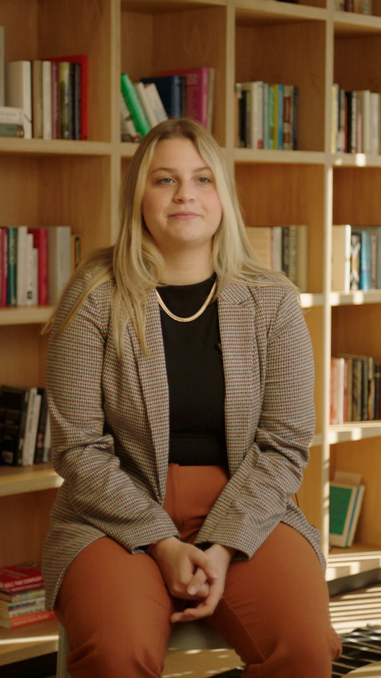 a person sitting in a library