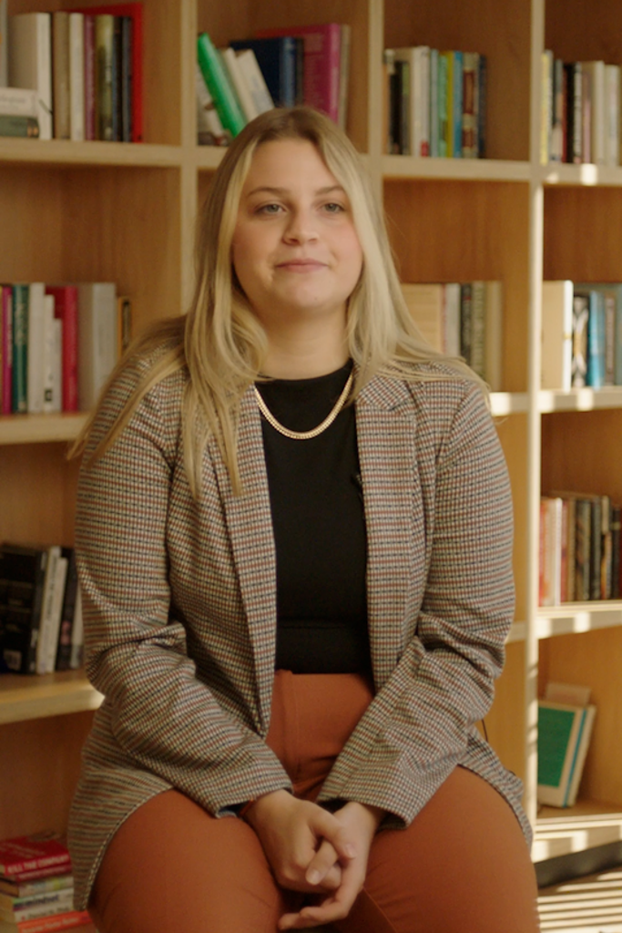 a person sitting in a library