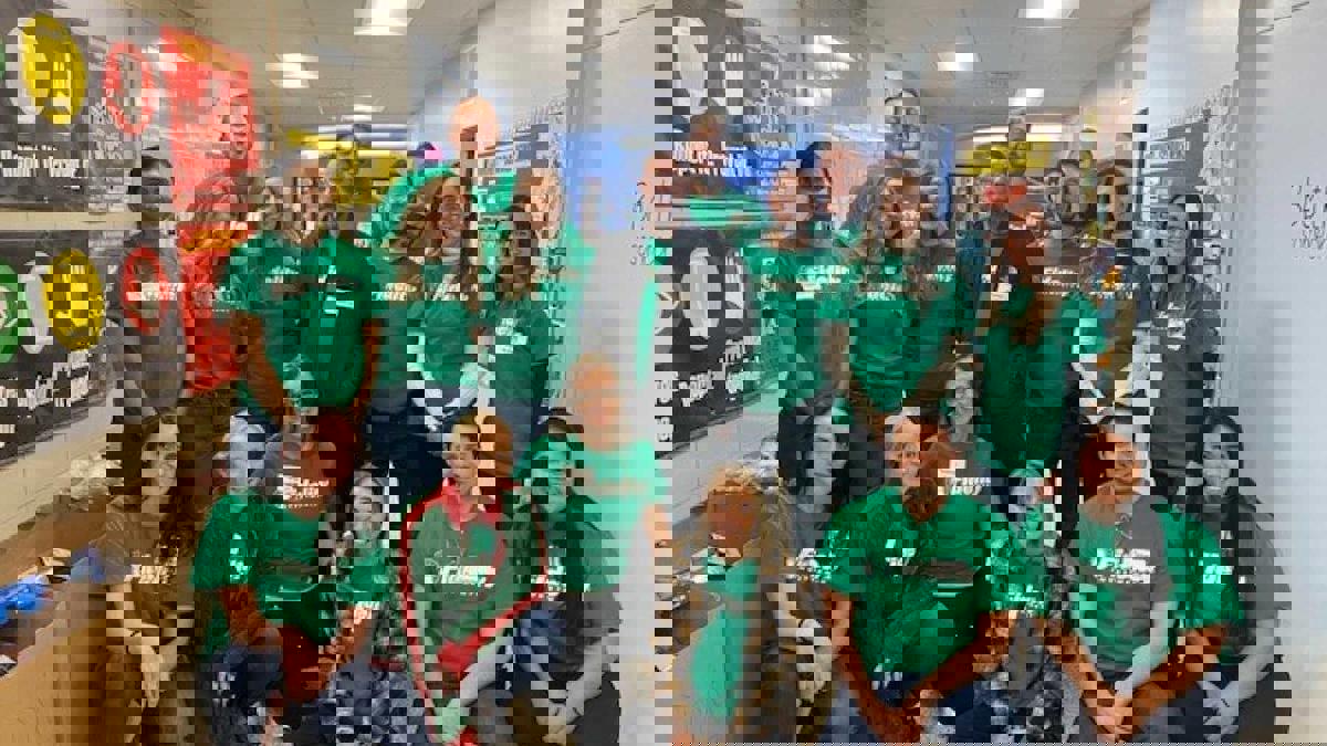 a group of people posing for a photo