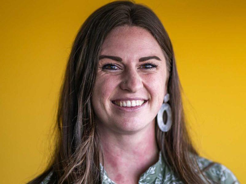 a person smiling at camera