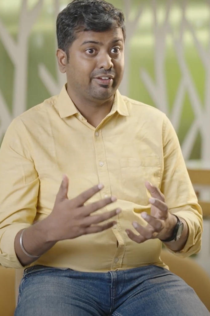 a person in a yellow shirt