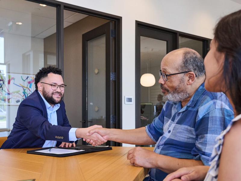 a person and person shaking hands